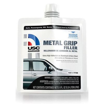 USC77706 image(0) - US Chemical 77706 Metal Grip Filler, 8 oz Pouch, Silver-Gray, Liquid